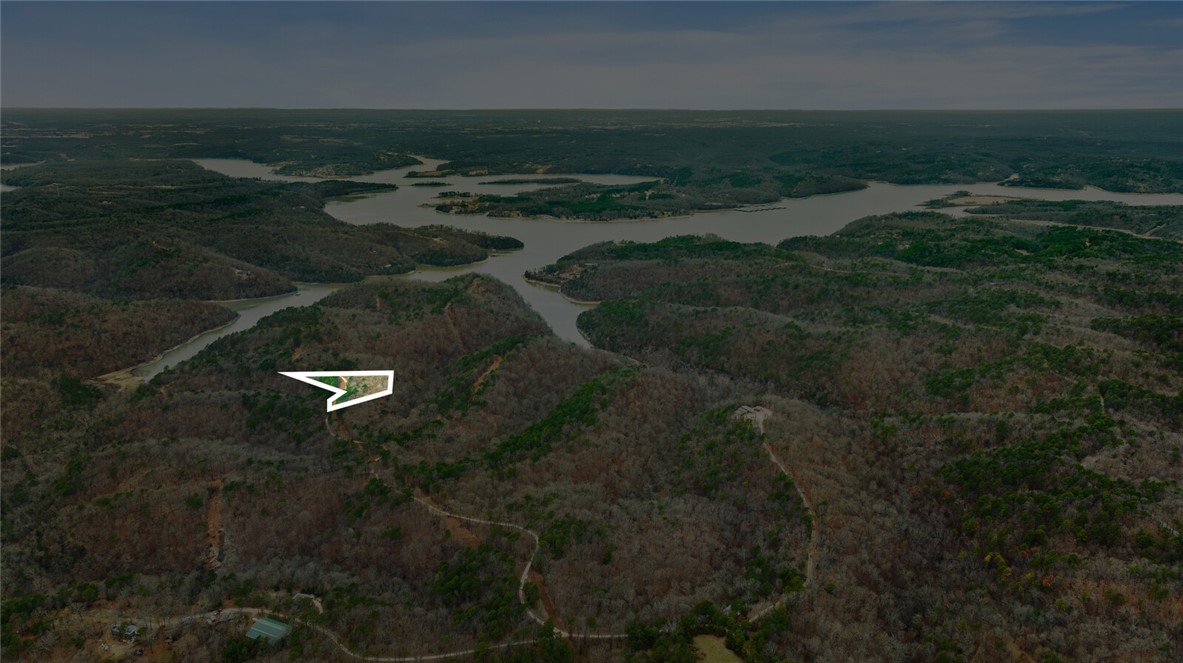 Discover the perfect canvas for your dream home with this stunning 5-acre tract in Emerald Bay subdivision. Boasting breathtaking views and endless potential, this property offers a serene retreat near the lake. While well water and septic are needed, electricity is already on-site, making your building process more convenient.
Located just minutes from the historic War Eagle Mill and a short drive to downtown Rogers, youāll enjoy the perfect balance of peaceful living and easy access to amenities. Whether youāre envisioning a custom home or a weekend getaway, this property provides the ideal setting to bring your vision to life. Donāt miss this rare opportunity to own a slice of Emerald Bay!