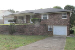 This well maintained home is move-in-ready and features 3 br 2 1/2 bth, large living room with wood burning fireplace, formal dining, washer and dryer hookup, 2 car garage, large covered deck. An extra B/R and garage down stairs with extra storage space. Nice neighborhood, prime location: Close to FedEx and Walmart along with lots of other shopping, restaurants etc.