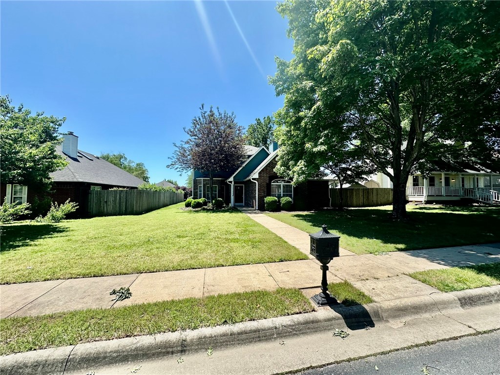 Spacious home in Bentonville! Features quartz countertops, open floor plan, and rear-entry 2-car garage. Enjoy a large fenced yard with covered patio, and an outdoor shed for extra storage. Quarterly pest control included! **No pets allowed.**