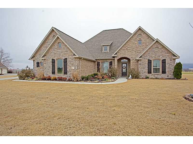 BEST value in beautiful Twin Falls! All the amenities you expect to find in Farmington's most beautiful neighborhood are in this one owner home. Enjoy stunning Ozark Mountain views and quiet sunsets on over 1 acre.,Upgraded appliances, 5 burner gas cooktop, double oven/convection, whisper-quiet dishwasher. You'll want to cook in this gorgeous kitchen. Spacious, beautiful, and priced below market!