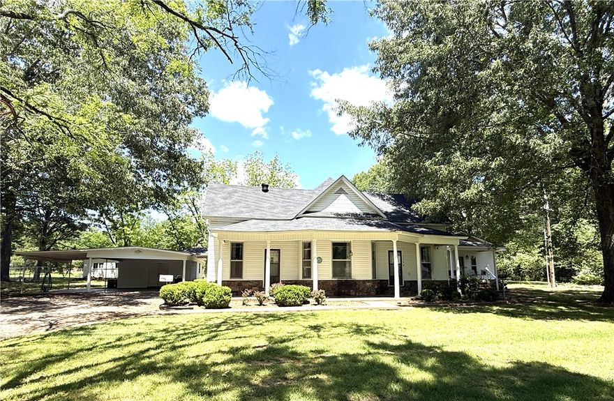 Nestled on a full acre, this unique property offers two homes in one—ideal for multigenerational living, rental income, or guest accommodations. The main residence features 2 spacious bedrooms, 2 full baths, and a versatile bonus room and other spaces perfect for an office, playroom, or additional bedroom. The attached but separate mother-in-law suite offers private living with its own entrance, bedroom, kitchen, and bath—providing comfort and flexibility for extended family or guests. You’ll fall in love with the home’s character: warm details, inviting living spaces, and picture-perfect setting. The property also includes a detached carport with workshop area, a functional outbuilding perfect for additional storage, and plenty of outdoor space for gardening, relaxing, or entertaining. Conveniently located just minutes from town amenities, this one-of-a-kind property is ready to welcome you home.