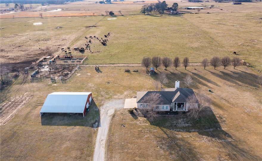FARMERS. DEVLOPERS. DEVLOPERS. FARMERS. Beautiful  3 Bedroom 2.5 Baths home with 75.43 acres that is crossed fenced has 4 auto base waters that water multiple pins and pastures. Farm has a nice pond that has been cleaned out. Farm currently takes care of 40-50 mother cows and is self sufficient in hay. Very good dirt 95% cleared and flat. Heavy duty working pins with squeeze chute. Work shop is 60x48 with electric and water. Farm is currently on well water with a paid for Gentry water tap for rural water. Property has road frontage on 3 sides which is a developers dream. 30-45 minutes from  from any where in NWA. Home was remolded in 2019 with new hardwood floors threw out home. Updated kitchen with painted cabinets with new hardware and lights. Granite counter tops with new Stove and Microwave. Updated Master bedroom with new shower, tub, granite counter tops, flooring and lights. New front doors and windows with wood shades. New water heater and water softener. New Garage doors and outside lights. Very nice place