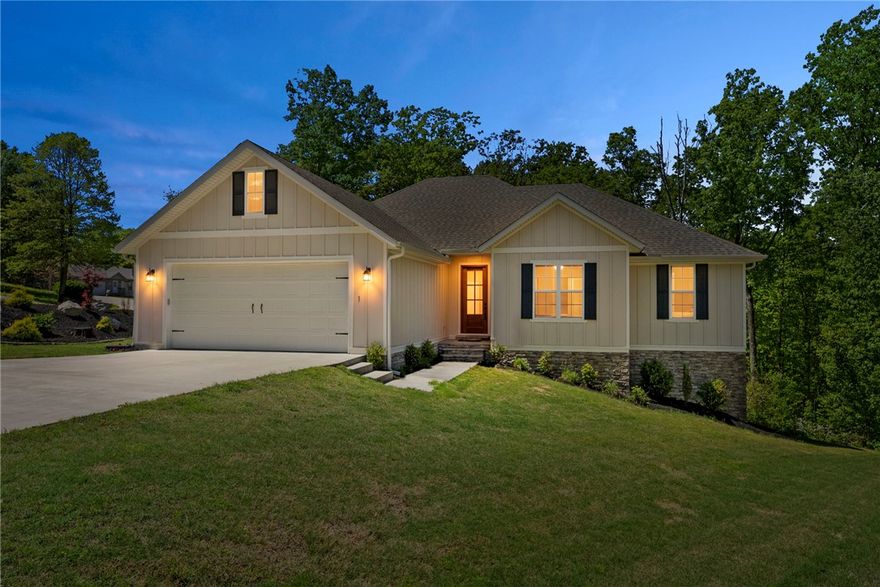 Tucked into the trees on a beautifully landscaped corner lot, this meticulously maintained, one-owner, craftsman-style 4-bedroom, 2 full bath home offers the perfect blend of privacy, natural beauty, and convenience. Backing to POA-protected woods, the covered deck and private fire pit offer a peaceful retreat. Inside, you’ll find a bright and airy layout filled with natural light, highlighted by a vaulted ceiling, quartz countertops in the kitchen, thoughtfully designed built-ins, and generous storage throughout. Enjoy quiet surroundings with easy access to the best of Bella Vista and a quick drive into Bentonville. From this little oasis, you'll be within walking distance of the Bella Vista trail system and the Metfield Recreation Complex, and you can bike to Blowing Springs via the Blowing Springs greenway connector. If you’re looking for a home that offers light, space, privacy, and connection to nature—without sacrificing convenience—this one delivers.