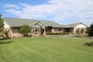 Terrific Package - 2 Homes - 23 Acres - Shop Bldg - includes spacious brick home approx 3150 sq ft on main floor, 20x30 ft family-dining-kitchen combo, wood stove on brick hearth, sunroom off kitchen, separate dining & living room with brick fireplace, nice entry, 10 ft ceilings, crown moldings, oversize master bedroom with private deck, large bath, jetted tub, separate shower & huge walk-in closet, large family room in basement, whole house generator, breezeway, 3 car garage, over 1200 ft of decks with brand new flooring & railing, newer roof, 900 ft well, and more. 30x42 ft shop building, 2nd home is 16x72 ft 2 bed/2 bath mobile home, land has some pasture, lots of wooded area, deer & wildlife, located on paved road about 15 minutes to Harrison or Branson. Come See to Appreciate!!