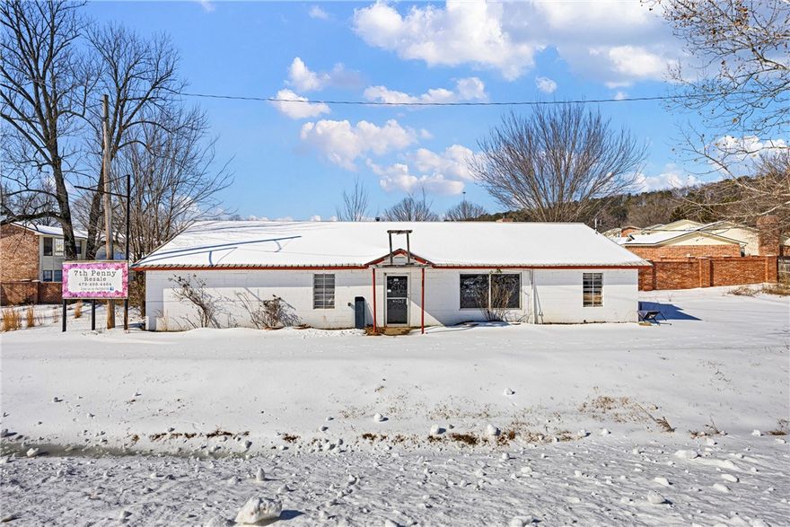 Prime commercial block building located just north of Russellville with high visibility and strong traffic counts on Highway 7 — ideal for a wide range of business uses. This versatile 2,046 sqft property features a spacious, open interior that can be easily configured to suit your specific needs, whether you’re planning retail, office, showroom, service industry, or other commercial operations. This property presents an outstanding opportunity for businesses seeking a high-traffic location with adaptability and strong regional presence. Contact me today for more details or to schedule a tour!