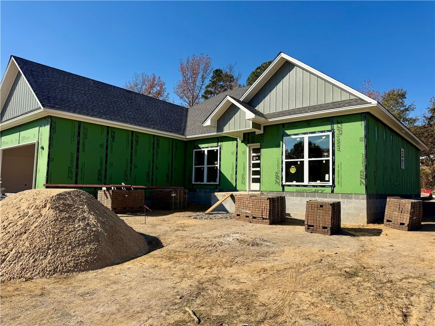 Imagine stepping into a brand new home where every finish reflects your style. 35 Rachel Circle in Russellville is a beautiful new construction home that is currently being built and ready for its first owner. This is a great opportunity to step in early and select certain finishes and custom features, allowing you to create a home that truly feels designed with you in mind.

The floor plan includes 3 bedrooms plus an office that can function as a 4th bedroom, along with two and a half bathrooms. The kitchen will feature an upgraded island layout with granite countertops and modern finishes throughout. The primary suite offers a relaxing retreat with a tiled walk-in shower, a free-standing soaking tub, and a spacious walk-in closet.

If you have been searching for a quality new construction home, look no further than this one. Schedule your tour and watch your future home come to life.