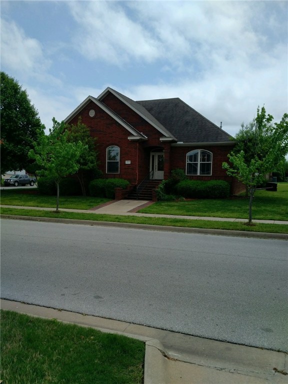 Great all brick home on corner lot! Home features 4 bedrooms, 2 baths, 2 car garage, gas log fireplace in living area, master bath complete with Jacuzzi tub and separate shower. Home has wood floors in dining and living area. Kitchen has built in wine fridge, cherry cabinets & breakfast nook. Home has enclosed sunroom & wood patio for entertaining. All appliances.