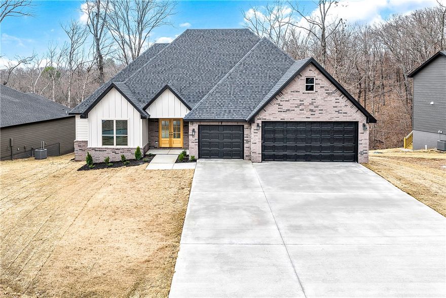 Welcome home to this stunning brand-new construction nestled in the heart of Bella Vista! Built by Constellation Properties, this 3-bedroom, 2-bath home offers 2,635 square feet of thoughtfully designed living space on a cleared 0.36-acre lot. You'll love the upscale finishes throughout, including granite countertops, luxury vinyl plank flooring, walk-in closets, and a cozy gas log fireplace. The brick/board exterior, covered patio, and deck make outdoor living a dream, while the spacious 3-car attached garage adds everyday convenience and plenty of storage. As a Bella Vista POA community member, you'll enjoy world-class amenities including pools, tennis courts, walking and mountain biking trails,  boat docks on mulitple lakes, clubhouse, golf courses, exercise room, and so much more. Zoned for Bentonville Schools and located near parks and trails, this home truly has it all. Don't miss your chance to be the first to call this beautiful new build yours!