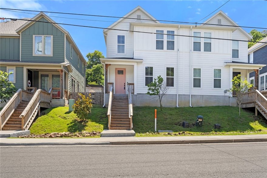 Welcome to 344 N Fletcher Ave, a sleek, architecturally designed townhome built in 2022, and priced to sell! Located mere blocks from Downtown Fayetteville's vibrant Square and Dickson Street nightlife, this 1734 sq ft, 3-bedroom, 2.5-bath unit blends modern style with prime convenience. A chef-ready kitchen shines with custom cabinets and quartz surfaces, flowing into an open-plan living area. Retreat to the luxe primary suite with a spa-ready bathroom or relax on your covered front porch with a cup of coffee. With two carport spaces, low-maintenance floors, and walkability to amenities, this home lets you enjoy sophisticated urban living-without compromise. Book your private tour today! Washer dryer, and Fridge convey. Seller is willing to convey all furniture with a reasonable offer.