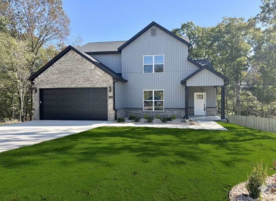 Gorgeous new construction home nestled in Bella Vista. Centrally located minutes from shopping, restaurants, and schools. Enjoy sitting on your covered deck enjoying this amazing lot, all the mature trees and privacy. Great home with fantastic layout, tray ceilings throughout and large rooms. Secondary bedroom on the main level. Large living room with beautiful gas fireplace, open floorplan LVP flooring on the main level and views of the mature trees. Kitchen has custom wood beam with vaulted ceiling, granite countertops, stainless steel appliances, large eat-in kitchen area and pantry. Large master bedroom with LVP flooring and spa like master bathroom has double sinks, soaking tub, walk-in tile shower with bench and large walk-in closet. Secondary bedroom on the second floor, large bedroom upstairs with extra storage and large bonus room for all your needs! Relax on the covered deck with stairs down to the backyard overlooking the fully fenced and sodded backyard and views of the mature trees.