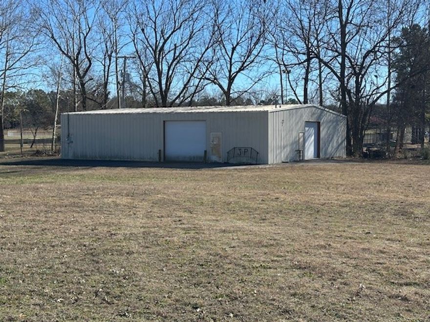 Unlock Your Business Potential! This is a fantastic opportunity for small enterprises, storage facilities, or repair shops. Located in a highly visible area near Wal-Mart and Flippin City Park, this property features a spacious 60 x 60 red iron building with durable concrete floors and electric heating. Additionally, the site includes a 24 x 40 building, perfect for various uses. Spanning approximately 1.40 acres m/l of level ground, the land is equipped with city water and sewer, providing convenience for your business operations. Don’t miss out on this prime location to establish or expand your business!