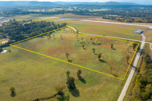 27.07 Acre Parcel at the corner of Airport Rd & Gipson Rd. Lies in the ''Opportunity Zone'', which allows tax deductions to the buyer. Will Divide
