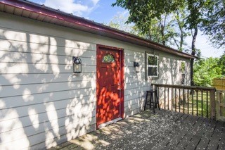 Welcome to this charming home in the heart of Fayetteville, AR! This cozy 2-bedroom, 1-bathroom home is less than half a mile from the University of Arkansas campus, shopping/dining entertainment district and only minutes from Dickson Street/Fayetteville Square! Zoned RMF-24, this land has lots of other possible developmental potential. The home has a lease in place and also currently holds a STR license.