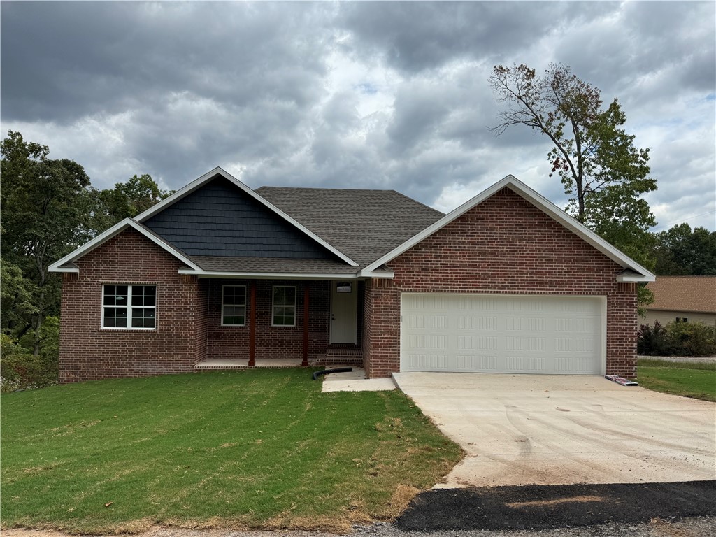 New Home sitting on Huge flat open lot fully sodded. This home Features a open flowing floor plan from the kitchen to the living room. The kitchen is loaded with stained cabinets, Quartz countertops and back splash. The living room is open with windows, a gas log fireplace and LVP floors. The master suite has 1 large walk in closet a master bath with large walk in tile shower with a bench. Also the spare bedrooms and bath a good size and will accommodate large furniture. Outside you can enjoy the covered front porch or the covered back deck.