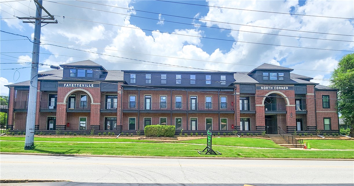 North Corner Condos - Luxury, Security & Location, All in One. Newly renovated & just steps from the University of Arkansas, North Corner Condos is a boutique 19-unit community perfect for students or investors. Unbeatable Location: Very close walking distance to University of Arkansas, Razorback Greenway, Dickson Street, Goat Lab Brewery/Restaurant shops, & bus stop at your door. Fully Renovated: New roof, windows, paint, gutters, and HVACāmove-in ready & low-maintenance. Modern Interiors: 3 designer packages include granite counters, premium fixtures, full appliance sets. Secure Living: Owner-only access to upper floors, keyless entry, cameras, & fire suppression system. Whether buying for your student or as a smart investment, North Corner Condos offer prime real estate in Fayettevilleās most desirable student hub. Multiple units with several different floor plans available. 2 and 3 bedrooms, all 2 full baths. Images featuring staged furniture depict model units. Individual units may vary in layout and finish.