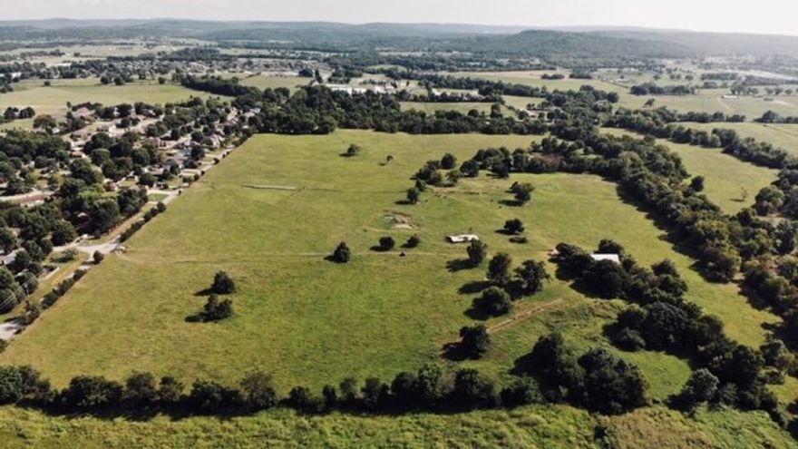 Great development potential. Close to school, next to subdivision development. Mostly cleared lot. Perfect place for residential. Exact acreage to be determined by survey (71 to 72 acres +/-). 30ft wide utility easement on northwest corner, 30ft wide easement to existing sewer main on southwest corner