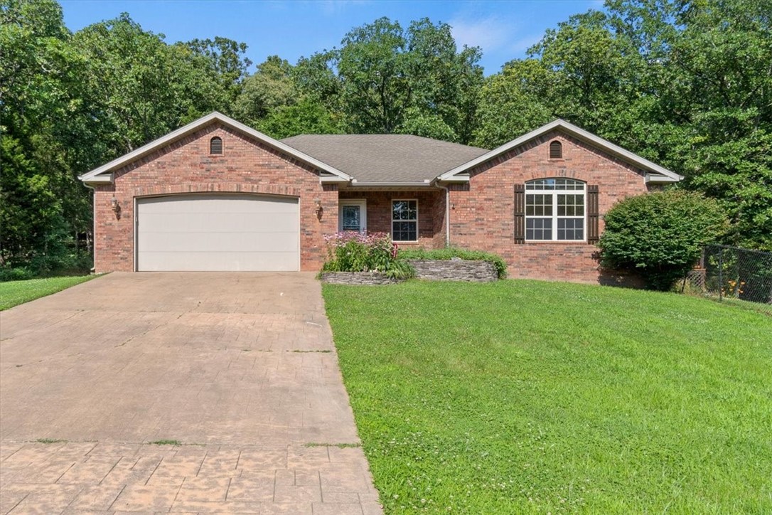 Welcome to Your Little Slice of Heaven!
Nestled on the edge of town, this charming brick and vinyl home is your private sanctuary, set on nearly 5 M/L acres of picturesque land. Despite being conveniently located just off Hwy 412, the serene views from your front porch will transport you to a tranquil paradise.
Step inside this move-in ready gem and discover a beautifully refreshed interior. Boasting 3 spacious bedrooms and 2 modern bathrooms, the home features fresh paint throughout and plush new carpet in all the bedrooms. The inviting sunroom addition floods the space with natural light and opens onto a deck, creating the perfect spot to relax and watch your pets play in the expansive yard.
Adding to its allure, this property includes a large 576 sq. ft. detached garage/shop complete with water and electricity. This versatile space is ripe for transformation into a cozy mother-in-law suite, workshop, or studio.
For a detailed look at the room dimensions and floor layout, be sure to see the pictures.