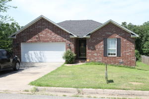 Ready for a newer brick home in a great subdivision? Call today, and schedule a private showing! This 3 bedroom, 2 bath home features a large, privacy-fenced back yard, wood laminate, carpet and tile floors. Enjoy peaceful views from the large, 2-tier deck. Crawlspace under house is large enough to use for storage. The 2-car garage includes a small storage area as well. All electric home.