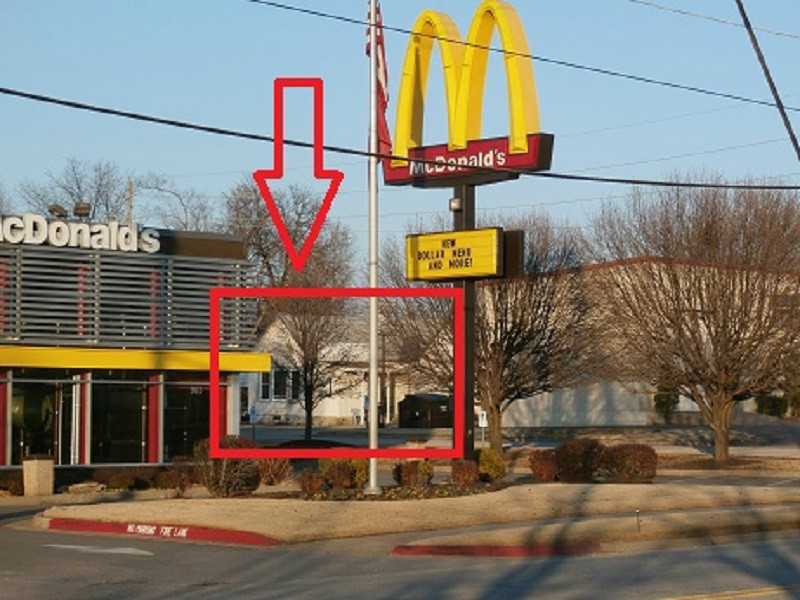 Great location! Multiple use building located in a high traffic area across from McDonald's, adjacent to sears and RNR Tire, zoned C-2. Currently a beauty shop, but would make a great office building. Great parking front and back. Sold "as is". This,building has been updated with roof, siding & double pane windows, floors, heat & air, and much more. Features paved and concrete parking lot w/8 parking spaces, & drive-around lane. Building only, not the business. Seller & agent related.