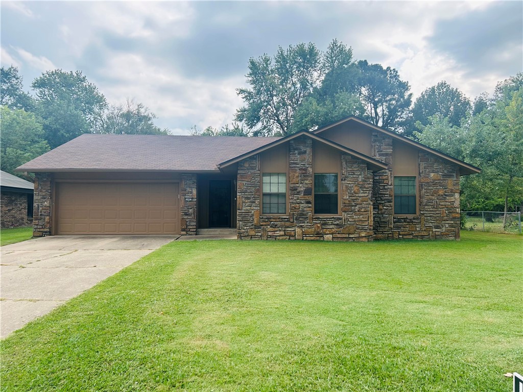 Elevate your lifestyle in this well maintained 3 bed 2 bath home nestled in the established Steele Subdivision, the heart of Springdale. The expansive backyard is a phenomenal bonus. Cozy up by the wood burning fireplace in the living room during the winter months. Within walking distance of Springdale Highschool, you can catch a glimpse of the stadium at the end of the street. You are just minutes from the vibrant downtown Springdale restaurants and scenic bike trails. This is the ultimate family haven.