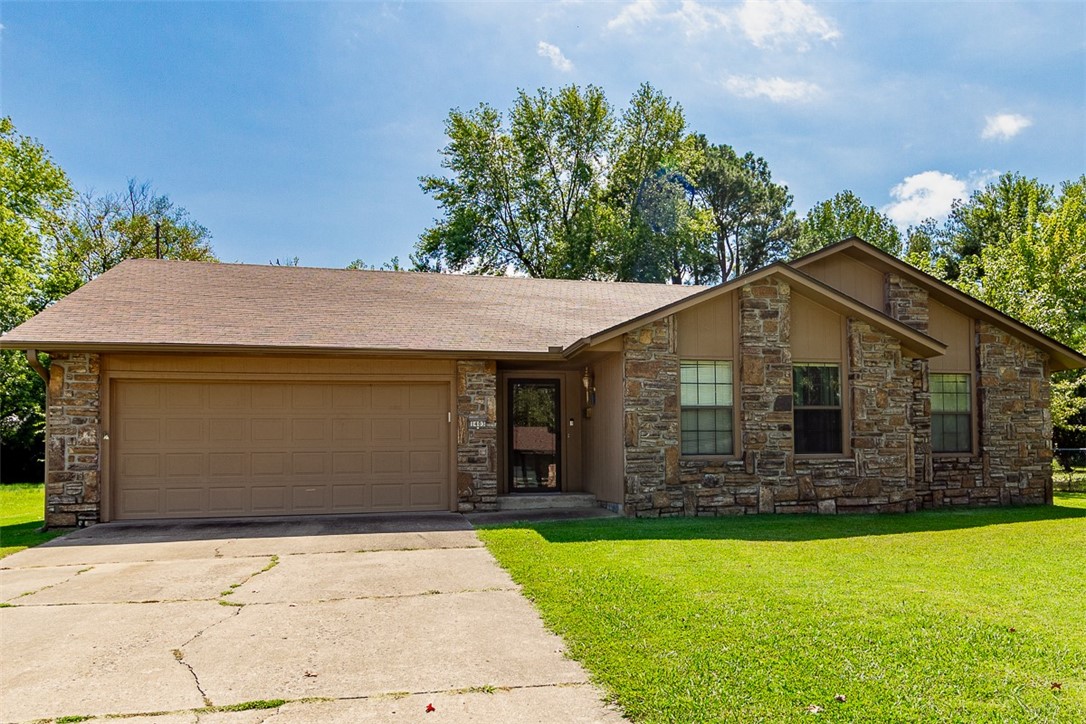 Elevate your lifestyle in this well maintained 3 bed 2 bath home nestled in the established Steele Subdivision, the heart of Springdale. The expansive backyard is a phenomenal bonus. Cozy up by the wood burning fireplace in the living room during the winter months. Within walking distance of Springdale Highschool, you can catch a glimpse of the stadium at the end of the street. You are just minutes from the vibrant downtown Springdale restaurants and scenic bike trails. This is the ultimate family haven.