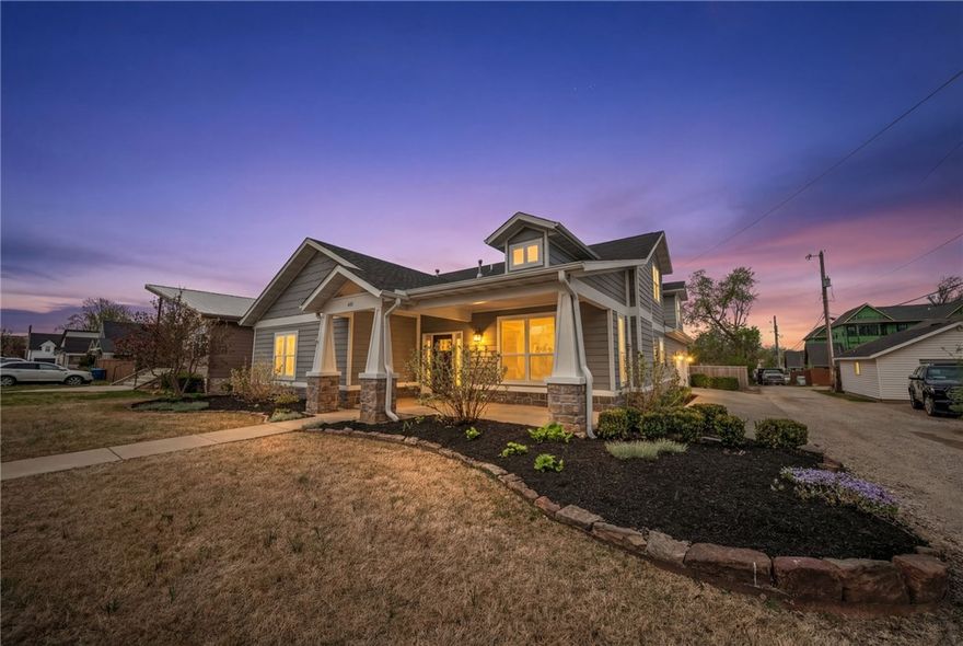 Beautifully updated home on a corner lot in Bentonville featuring a 2025-built pool, 10x20 solar-powered pergola with remote controlled shades & LED lights, & fully fenced backyard. The eat-in kitchen offers a large island, perfect for entertaining & everyday living. Main level includes 3 bedrooms, including a spacious primary suite with soaking tub & walk-in shower with overhead & handheld shower heads. Upstairs features a loft with built-in bookcase & kitchenette area with floating shelves, sink, & space for a mini fridge. The 5th bedroom includes built-in bookshelves, ideal for an office or flex space. Major updates include a Class 4 impact-resistant roof (2024) & downstairs AC replaced in 2024. Great layout with flexible living spaces inside & out in an incredible location in downtown Bentonville!