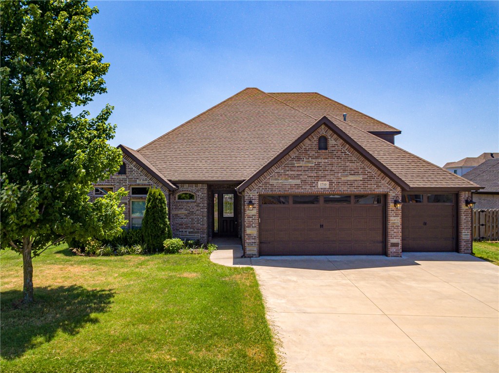 OPEN HOUSE this Sunday, July 24th, 1 to 4. This North facing home has 3 car garage, 3 or 4 bedrooms (bouns Room can be 4th Bedroom with full bath and closets) Great Kitchen with a built-in Freezer and Fridge, granite counters tops, a split floor plan 3 full baths, a great yard, and large covered patio with an outdoor fireplace, Nice size laundry room with sink. Washer & Dryer convey. Gas cook top built-in wall oven and microwave.