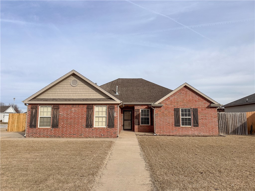 Highly sought and convenient Rogers, AR location. Very well-maintained all brick home. Large corner lot, new wooden privacy fence, expansive backyard. 3-bed, 2-bath, 1,582 sq ft. Open living, cathedral ceilings, gas fireplace, split floor plan, ample storage. Kitchen: eat-in area, island, granite countertops, abundant cabinets, oversized pantry. Wood plank ceramic tile throughout the house; carpet only in the master. Master suite: crown molding, dual vanity, 2 walk-in closets, separate tub, tiled shower. Sellers are offering a $5,000 Paint allowance/credit.