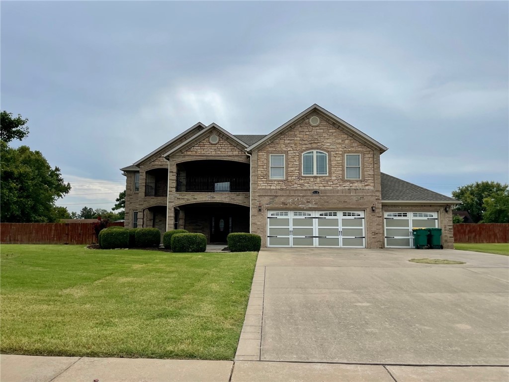 This home features lots of space on a one acre lot! Every bedroom in this 5 bedroom home has an en suite bathroom. 4 large patios or balconies all covered. Kitchen features stainless steel appliances and opens up to a great room with gas log fireplace. Large pantry. Formal dining with butler's pantry. Formal living room with gas log fireplace. Two story entry way. Oversized game room with covered balcony access. Extra storage space. Just minutes from shopping, restaurants and I-49.