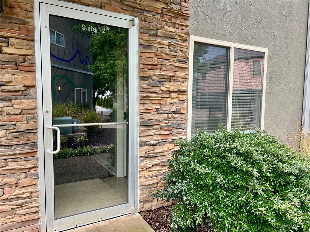 Professional office space available in a prime Bentonville location, just moments from the downtown square and within close proximity to Walmart’s new Home Office campus. This property offers an ideal setting for businesses seeking a central hub with strong accessibility and a professional presence. Featuring flexible office layouts, abundant natural light, and convenient nearby parking, it provides the perfect foundation for productivity and growth. Positioned in a vibrant business corridor surrounded by restaurants, retail, and major corporate offices, this space delivers the convenience and presence that modern companies need to thrive. Includes a storage/utility/tech closet, bathroom, and sink/fridge. Utilities package is an additional $200/month which includes everything except internet.