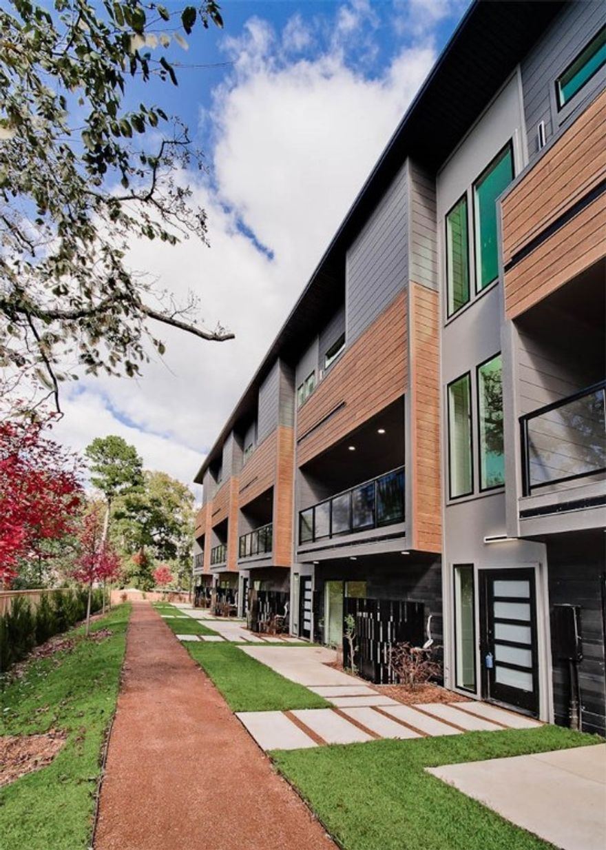 WELCOME TO DISTRICT 9/A! Modern living located across the street from Airship Coffee! Situated near the Crystal Bridges trail and the downtown square, this brand new condo offers both convenience and contemporary design. The property includes an attached 2-car garage and a community bike wash station, perfect for outdoor enthusiasts. Additional neighborhood amenities feature an outdoor grill and a fire pit, ideal for social gatherings. The contemporary kitchen is a highlight, featuring European cabinetry, exquisite quartz countertops, and a waterfall island. With modern fixtures and high-end finishes throughout, this condo exemplifies quality. Enjoy the elegance of glass balconies and the comfort of 3 luxurious bedrooms. The condo also includes 3.5 baths, designed with style and functionality in mind. Experience the ultimate luxury lifestyle with this exceptional property. Additional units are available.