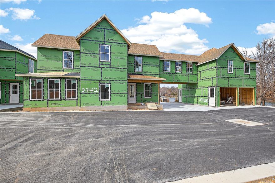 Welcome to Smyth Crossing – where history, community, and thoughtful design meet in East Fayetteville’s coveted Crossover area. Born from a vision to preserve the cherished home of immigrant Peter Smyth, this neighborhood blends heritage with modern living. Tree-lined streets, green spaces, and timeless architecture create a place to connect and celebrate the Ozarks’ beauty. Among its standout homes, The Prow House combines charm, function, and versatility. It features 4 beds, 2.5 baths in the main home- versitile space with 1-bath above the garage, perfect for guests or extended family. A welcoming front porch and private courtyard offer inviting spots for morning coffee or evening tea, while the open floor plan inside flows effortlessly for entertaining and everyday living. Luxury finishes and an efficient layout make this home as stylish as it is comfortable. Minutes from top schools, parks, trails, and shopping. More than a neighborhood, it’s a living tribute where legacies are honored and new stories begin.