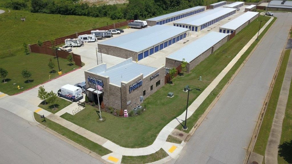 Newly built 5.5+/- acre storage facility. Total of 497 rental units; 210 climate controlled, 268 non-climate drive-up, 14 boat, trailer, or RV parking, and 5 parallel vehicle parking. 24 hour personal code access. 30ā in between buildings for easy access and all areas are paved concrete!! Office has multiple uses: Office, conference meeting room, living area if necessary (for on site manager). Located in one of the highest growth rates areas in northwest Arkansas! Close to Walmart Distribution Centers.