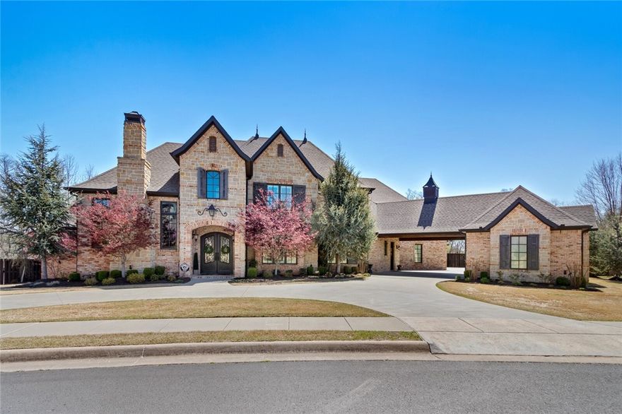 Exquisite 5 bedroom, 5 1/2 bathroom, one owner, custom-built home in the sought-after St. Valery Downs gated neighborhood. This gorgeous home is built to entertain! Home includes 2 bedrooms on the main level, a chef's dream kitchen with two dishwashers, a beverage fridge, a large hidden walk-in pantry, and more. Also on the main level is a state-of-the-art theater room with a fully equipped wet bar. Additional features of this home include impressive walk-in closets throughout, 2 laundry rooms, a dedicated office/study, a finished basement, a wine room, a steam shower in the master bath, whole-home generator, just to name a few amenities. And let's not forget the backyard which includes a covered patio with fireplace and outside kitchen area, a custom-built saltwater pool, a hot tub, a putting green, extra large yard, all lined by beautiful hardwood trees providing privacy. This is an ultimate must-see home!