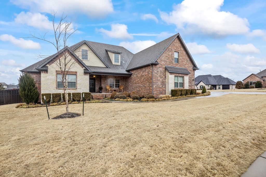 Spectacular newer home centrally located in a coveted Benton County subdivision, Otter Creek. This home has it all! Open floor plan has tons of natural light with a soaring beamed, cathedral ceiling. Large living area opens to a gorgeous custom kitchen with all the trimmings. Custom white cabinets, granite counter tops, upgraded appliances and tons of storage. Formal Dining and study off then entry, mudroom, a massive owner suite, 3 additional bedrooms with their own full baths all on the main level! Owner suite features a spa to die for- great vanities, oversized shower, whirlpool tub and spacious walk-in closet. This home also features a large bonus room upstairs, screened in porch overlooking the back yard and a split 3 car garage. The home sits on a large corner lot and is a quick walk away from the community pool and sports court. This is a great opportunity for a house that checks all the boxes, is close to XNA, the best shopping and restaurants and in Bentonville School district.