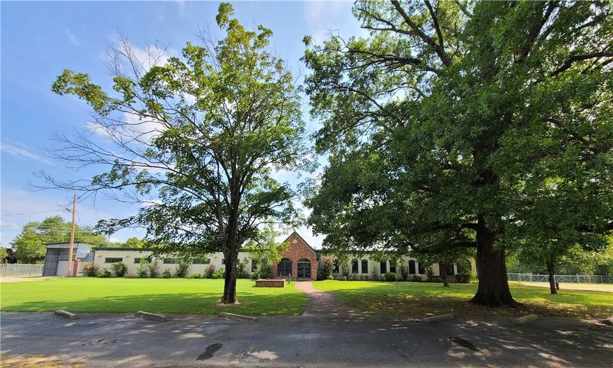 57,667 sf industrial/warehouse building with 15,000 sf of remodeled, air-conditioned office space situated on 7.1 acres. Office area features multiple offices, conference rooms, kitchen/breakroom, storage/file rooms, and bathrooms. Warehouse fully heated & sprinkled with numerous roll-up doors, dock, & drive-in doors. Fenced storage area with rail access. Additional acreage available.