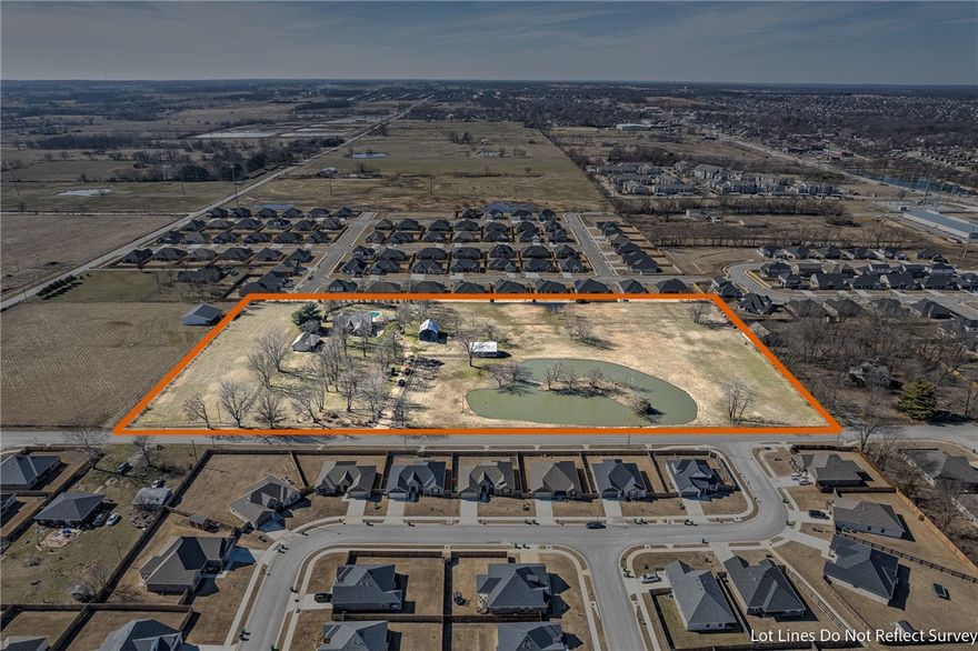 Own your very own park-like estate complete with historical 100 year old barn, stocked fishing pond w/ island, 2 shops, gunite diving pool with separate bathroom, gazebo, beautiful 3 bed / 2 bath home, and 10.29 acres - right in the heart of NWA. Only 10 min to DWTN Bentonville.  You will instantly feel peace and serenity when you drive through the gate.  Mature trees situated perfectly throughout the property.  Perfect for a private estate, event venue, hobby farm, or development. 
The home has 2 separate living areas with a warm and inviting pellet stove, features high end custom cabinetry throughout, an oversized dining room / sunroom surrounded with windows that allow you a beautiful view of the property.  Plantation shutters, timeless exterior, large kitchen with island, and so much more.  This property has everything you could ever want and more!  It's a must see!  Historic barn is 1,368 sq ft. Shop is 864 square ft., and barn/shop #2 is 912 sq. ft.