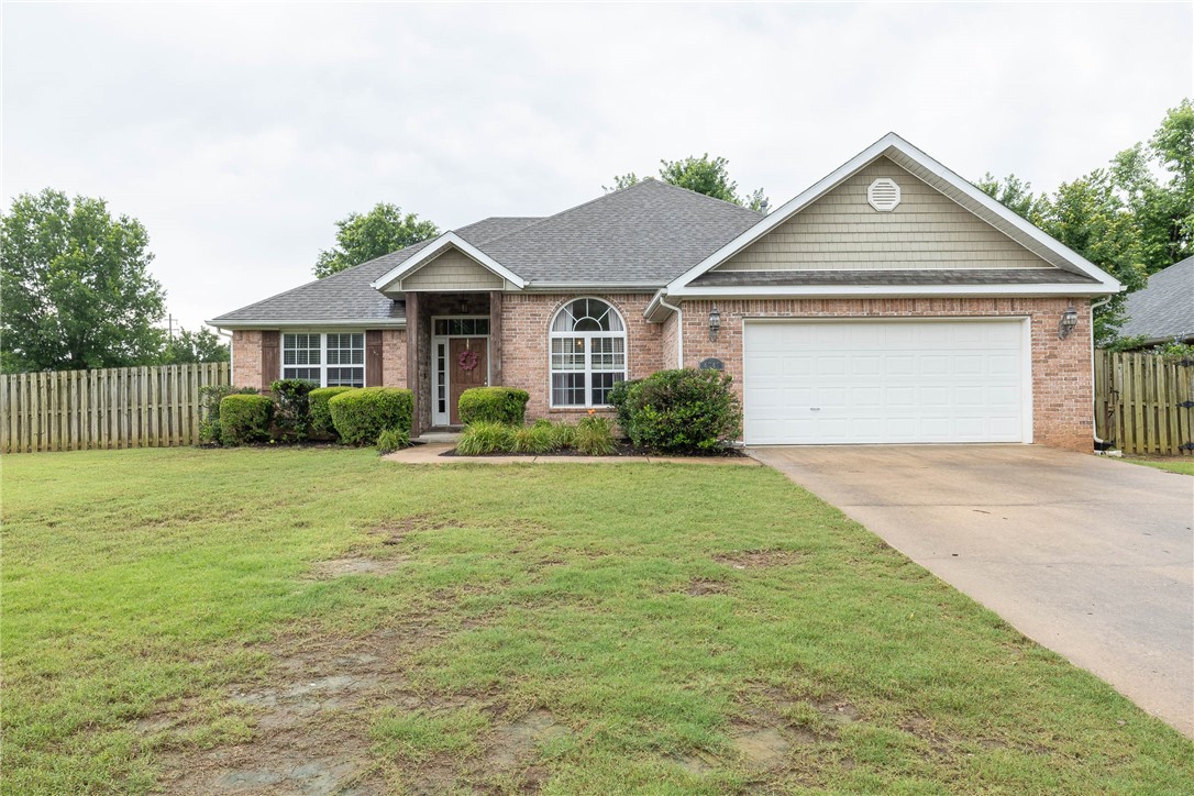 Located on a spacious corner lot in West Fayetteville’s Fairfield subdivision, this well-maintained home offers comfort, functionality, and an easygoing lifestyle. Fresh paint, professional landscaping, and a privacy-fenced backyard set the tone. Inside, the flexible layout includes a formal dining room (or office), eat-in dining, and a cozy living room with a gas fireplace. The kitchen features granite countertops and stainless appliances. The vaulted primary suite offers a relaxing retreat with jetted tub, walk-in shower, double vanity, and walk-in closet. Two guest bedrooms share a full bath, and the outdoor patio is perfect for laid-back evenings. Conveniently located near I-49, the U of A, and Underwood Park—this one is ready to welcome you home.