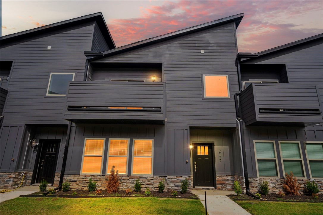 Brand New townhome in hot location just minutes from I-49! 3 Bedroom 2.5 Bath modern townhome makes for a great primary residence or investment property. Snag this one up now before it's gone. Estimated completion date May 2023. More photos to come as construction progresses.