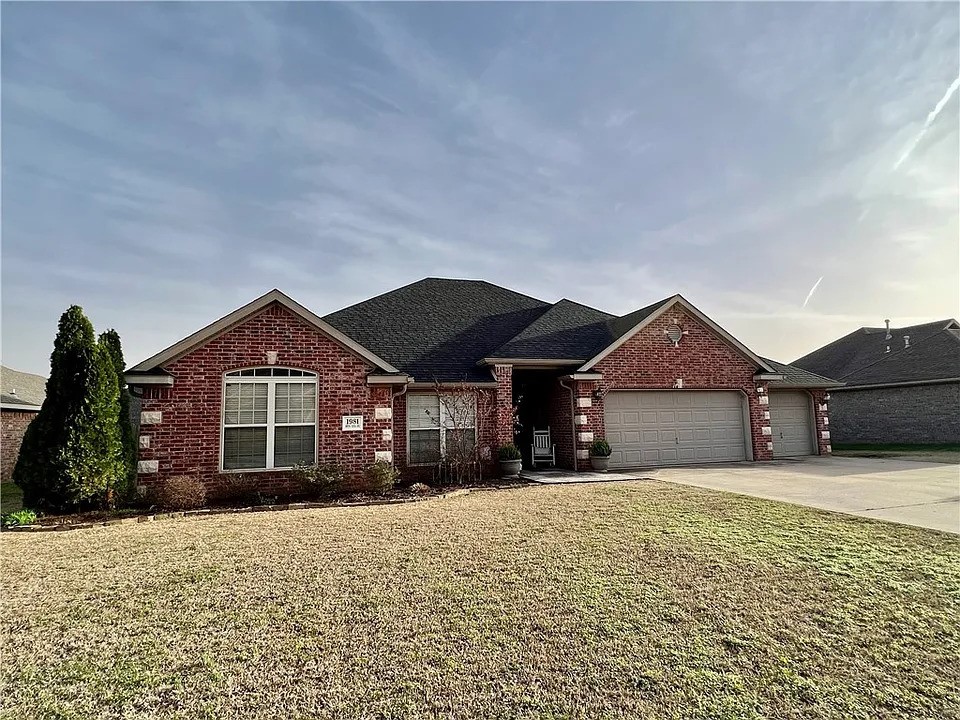 Lovely 4 bedroom 2 bathroom home conveniently located just off Don Tyson. Split floorplan and open concept living. 3 car garage allows for additional storage. Unwind on the covered back patio and enjoy all of the nearby amenities.