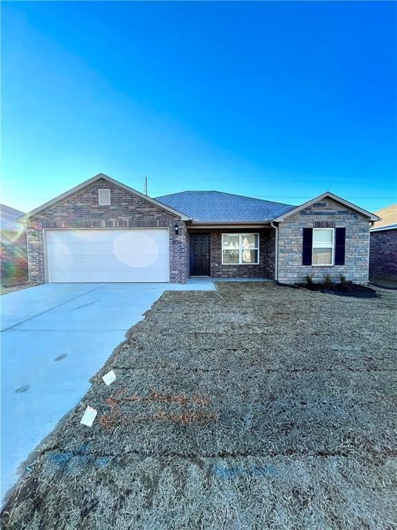Brand new house just minutes from the University of Arkansas and downtown Fayetteville. This home's kitchen boasts granite counter tops, stainless steel appliances and a pantry. The split floor plan allows for privacy. The primary suite located on one side of the home has a large vanity, tiled soaker tub, plenty of storage and a large walk-in closet. The two secondary bedrooms are on the other side of the home and share a bathroom. This adorable home has luxury vinyl plank throughout the living areas and the primary suite making for easy cleaning. With a two car garage, covered front porch for sitting and fenced in back yard- this home will be sure to please! Refrigerator is included.