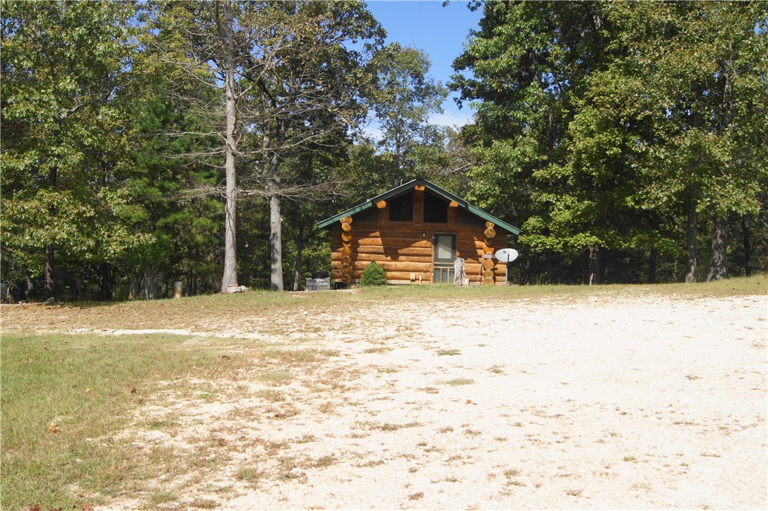 Four cabins on 10 acres within walking distance to Beaver Lake. All 4 are currently leased with a gross income of $2425.00/month. Rustic and authentic. Each cabin varies in size from 560 sqft with 1 bedroom to 900sqft with 2 bedrooms. Would make an awesome Airbnb environment. Beaver Lake just down the road with public access. All this just 20 mins from Rogers.
