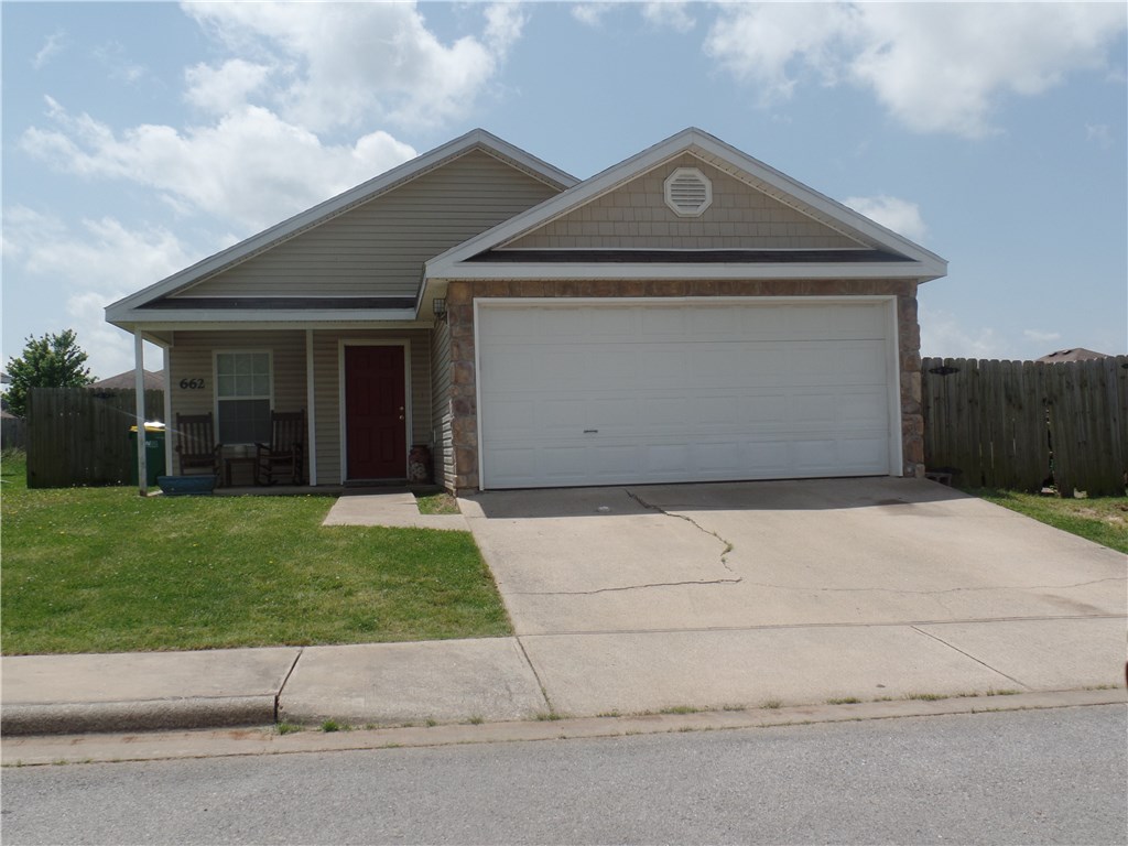 Great for investor or first time buyer. Cute 3 bedroom, 2 bath with tile and laminate flooring. Easy maintenance. New cabinets in kitchen with beautiful glass back splash. 2 car garage.