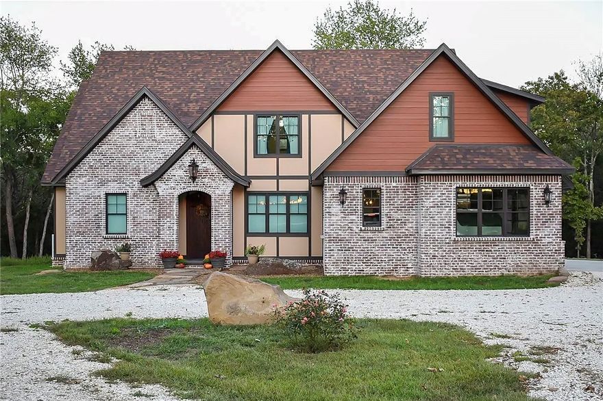 60-acre regenerative farm in Lincoln, AR, designed for rotational grazing, sustainable agriculture, and multi-generational living. Ideal for homesteaders, ranchers, or those seeking an income-producing rural property.
The custom Tuscan-inspired main home features 5 bedrooms + office, showcasing craftsmanship with hand-scraped hickory floors and forged iron details. Additional highlights include screened porch overlooking a creek, heated floors in the primary bath, in-ground tornado shelter, and energy-efficient construction.
Ideal for livestock with 30 ac pasture, 30 ac woods, electric fencing, 13 water points, and 5 ponds.
Multiple living and income opportunities include a 960 sqft secondary home (rental or mother-in-law suite), an 800 sqft barn-dominium under construction, and 2 RV sites—perfect for Airbnb, tenants, or a multi-family. Also includes a 40x60 heated shop.  Near Fayetteville, this property offers privacy and functionality in Northwest Arkansas. Pre-qual or proof of funds required prior to showing.