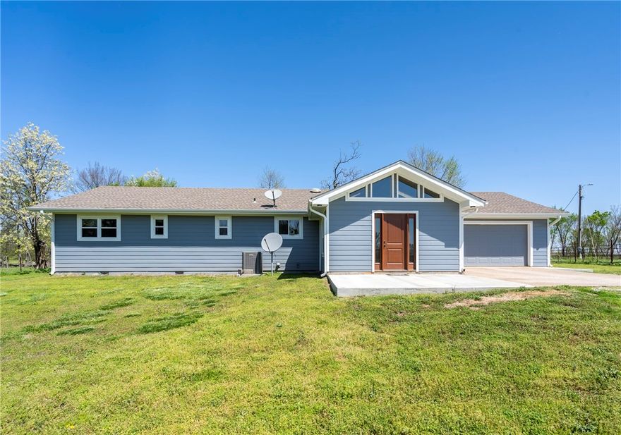 Secluded Country Retreat on 23 Acres – Just Minutes from Siloam Springs! Escape to your own private
oasis with this stunning 23-acre property, perfectly balanced between open pasture and woods. Nestled on
a peaceful hilltop just outside Siloam Springs, this spacious 3-bedroom home offers over 1,700 sq ft of
comfortable living space, plus an additional 800 sq ft of partially finished basement with a bonus area—
perfect for a home office, guest suite, or game room. Enjoy the outdoors with your own pond, a steel pipe
working corral, and a 40' x 70' pole barn equipped with water and electricity—ideal for livestock, hobbies,
or storage. Recent upgrades add peace of mind, including a new roof (2017), HVAC system (2023), and
windows, siding, and gutters (2024). Whether you're looking for a hobby farm, a private homestead, or
simply a quiet place to call home, this one-of-a-kind property delivers it all.