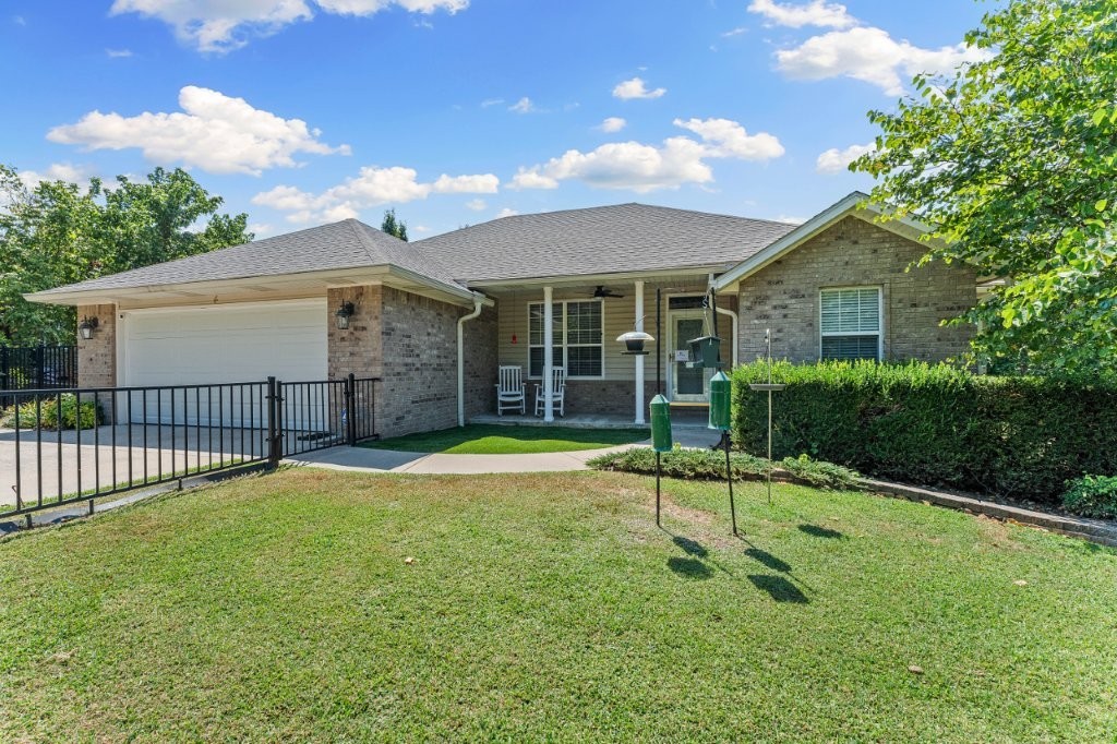 Square footage lives large in this home that shows pride of ownership! Great Metfield location near park, pool, golf course, trails. The backyard is an entertainers dream! Large deck, & your own built-in gazebo. Wood floors welcome you to the flexible plan w/Living, 2 dining areas. Step out of the kitchen onto a screened in porch. Primary has large closet, walk in shower. Lower level is light and bright, w/ two bedrooms, bath, and bonus room. Homeowner has made many updates including roof, hvac, water heater, micro, dishwasher, whole house generator & much more! Ask your agent for amenity sheet for more info! Amazing lower-level storage. On sewer. Bentonville schools. Live the good life in Bella Vista!