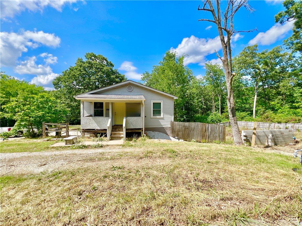 This duplex sits on .81 acres and is currently zoned RMF-12. This property is only a 6 minute drive to the University, 4 minutes to I49, and 10 minutes to Dickson St. The upper level unit offering a split floor plan with 3 bedrooms, 2 bath and original hard wood flooring throughout the open dinning and kitchen to the large living room. Downstairs includes 2 bedrooms, 1 1/2 baths, office space. The lot includes four spaces off street parking. Also selling as duplex on .37 acres at $249,700 and .44 acre lot at $80k. ML#1312823 for .44 acre lot.