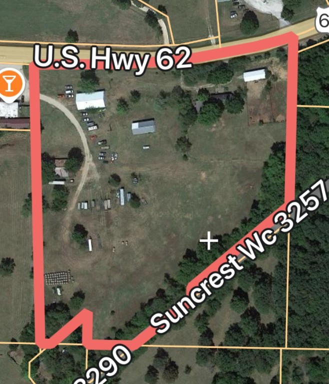 Historically used for ag related production, its high time to take this 9.4 acres to its highest and best use!! With ~700' of Highway 62 frontage and nearly 11,000 cars per day this is a commanding location for serious business. Adjacent to neighboring business with high traffic count. Semi flat elevations makes site work manageable Storage facility, retail flex space or an rv park, all will stand to reap the benefits from the high traffic count and current path of growth. Some structures on the property, may or may not suit your long term needs, but lend themselves nicely for existing storage options.