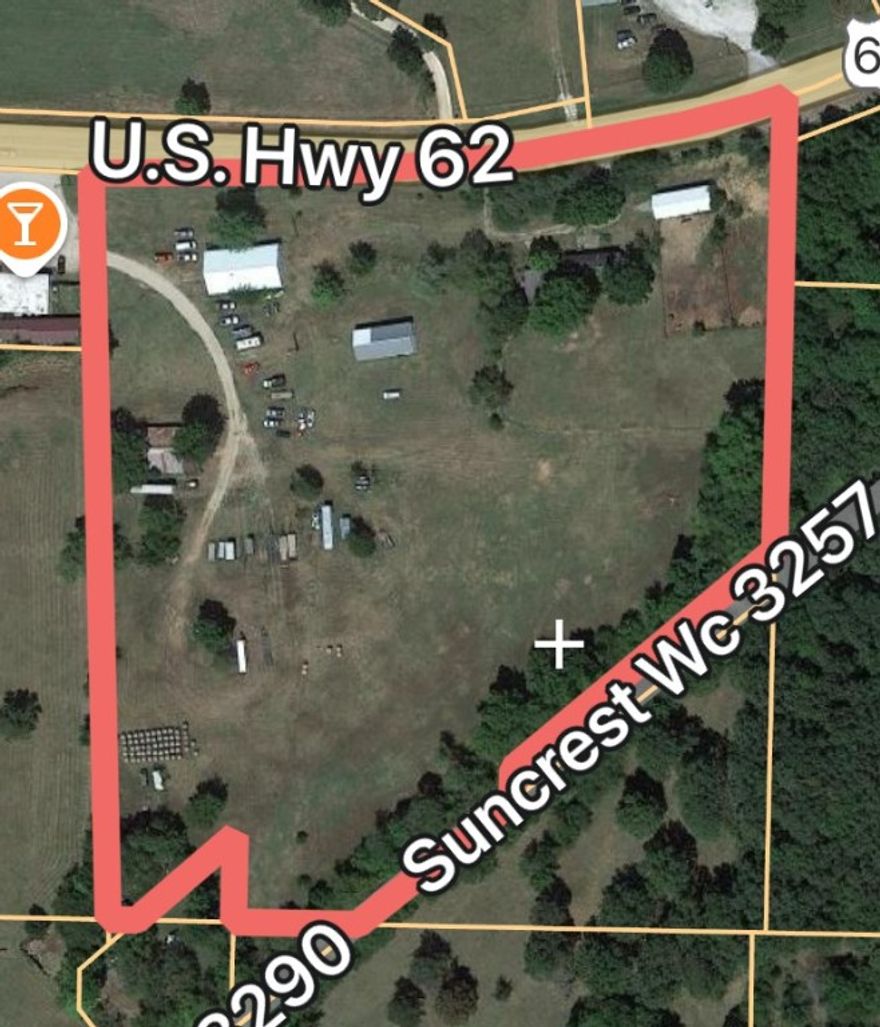 Historically used for ag related production, its high time to take this 9.4 acres to its highest and best use!!  With ~700' of Highway 62 frontage and nearly 11,000 cars per day this is a commanding location for  serious business.  Adjacent to neighboring business with high traffic count.  Semi flat elevations makes site work manageable   Storage facility, retail flex space or an rv park, all will stand to reap the benefits from the high traffic count and current path of growth.  Some structures on the property, may or may not suit your long term needs, but lend themselves nicely for existing storage options.
