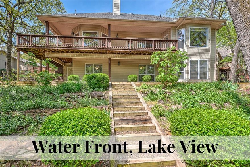 Welcome to your private oasis on the shores of pristine Beaver Lake! Nestled in the Lost Bridge Village community, this beautifully maintained home blends lakefront luxury & modern updates. Whether you’re seeking a full-time residence, vacation escape, or high-performing short-term rental, this property delivers. Step outside and you're just steps from the water’s edge—perfect for swimming, kayaking, or launching your next adventure. Panoramic lake views grace the main living spaces, and expansive decks invite you to relax or entertain against the serene backdrop. Inside, the home features a bright, open floor plan with thoughtful updates, including a new roof (2024) and HVAC system for peace of mind and efficiency. Stylish finishes, natural light, and cozy gathering spaces make it both inviting and functional. Residents enjoy a private clubhouse, seasonal pool, and community boat launch—ideal for making the most of lake life. Proven Airbnb success makes this home turnkey-ready for investors and lake lovers alike.